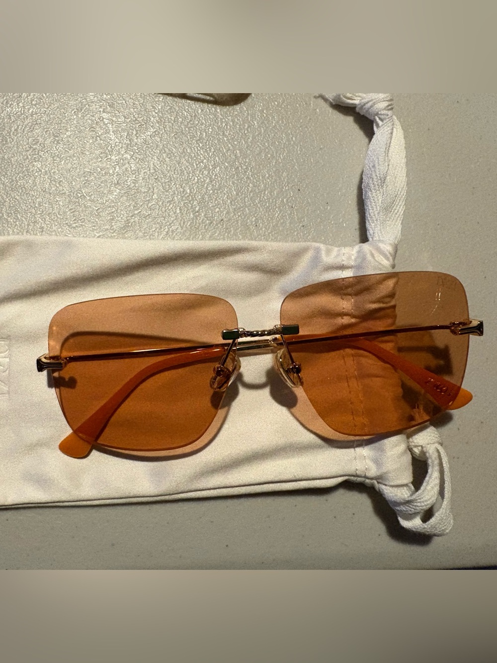 Desi Perkins - QUAY Orange Sunglasses